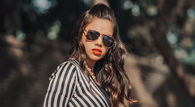 Andrea San Martín posó alegre para fotografías junto al padre de su hija