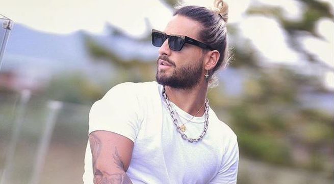 Maluma preocupa a sus fans luego de publicar foto en camilla de hospital