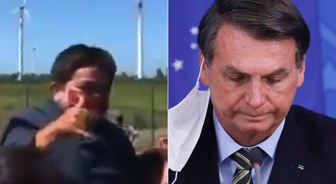 Jair Bolsonaro confunde a un hombre de baja estatura con un niño y lo carga por error