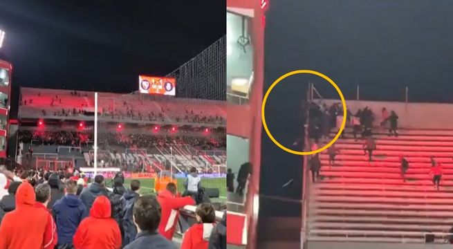 Hincha cae al vacío durante disturbios en partido de Copa Sudamericana | VIDEO