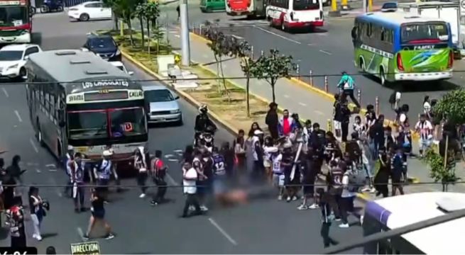 Enfrentamiento entre barristas deja dos heridos de bala y caos en plena vía pública